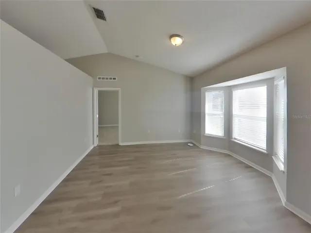 an empty room with windows