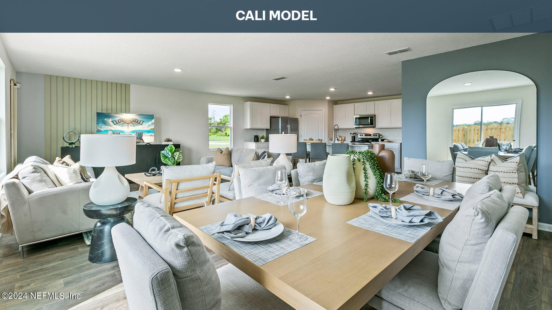 5561 Rustic Thorn Road Jacksonville, FL 32219 - Photo 14 of 63 a living room with lots of furniture and kitchen view