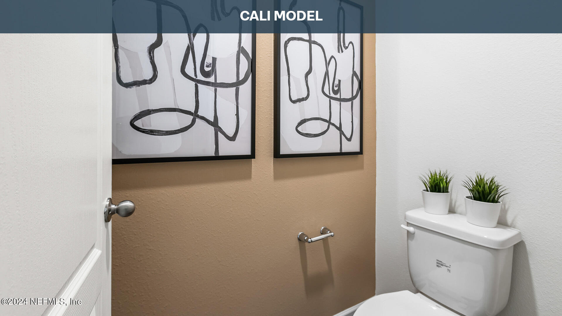 5561 Rustic Thorn Road Jacksonville, FL 32219 - Photo 19 of 63 a bathroom with a toilet and a sink