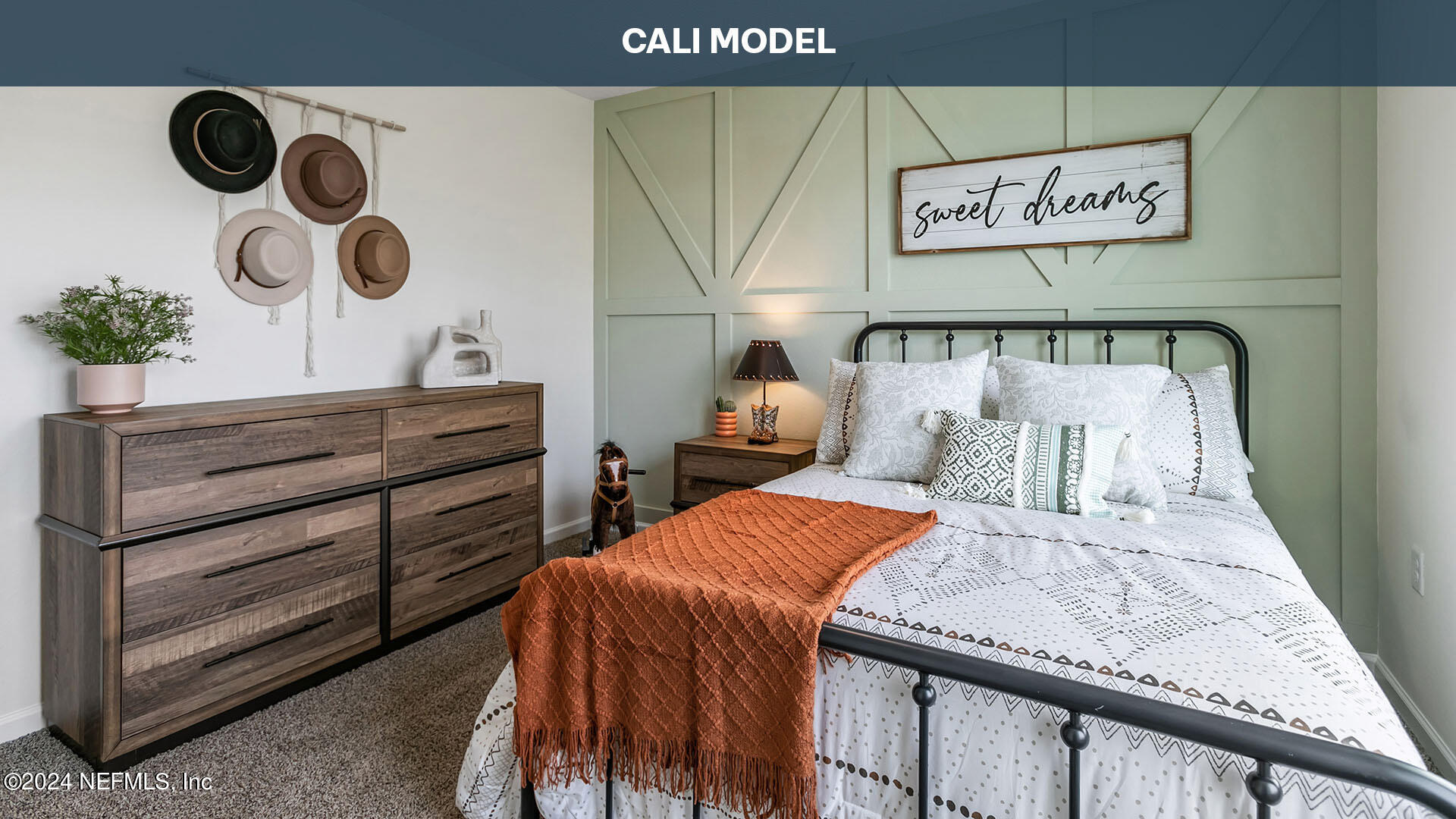 5561 Rustic Thorn Road Jacksonville, FL 32219 - Photo 20 of 63 a bed room with a bed and cabinets