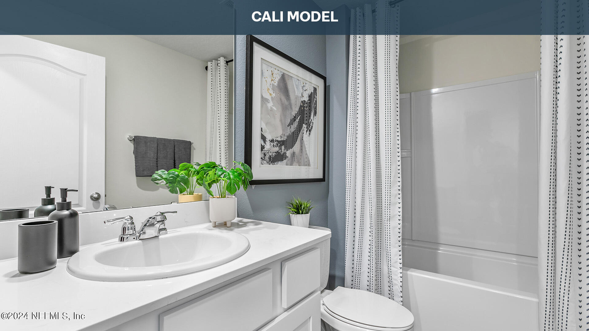 5561 Rustic Thorn Road Jacksonville, FL 32219 - Photo 25 of 63 a bathroom with a sink toilet and shower