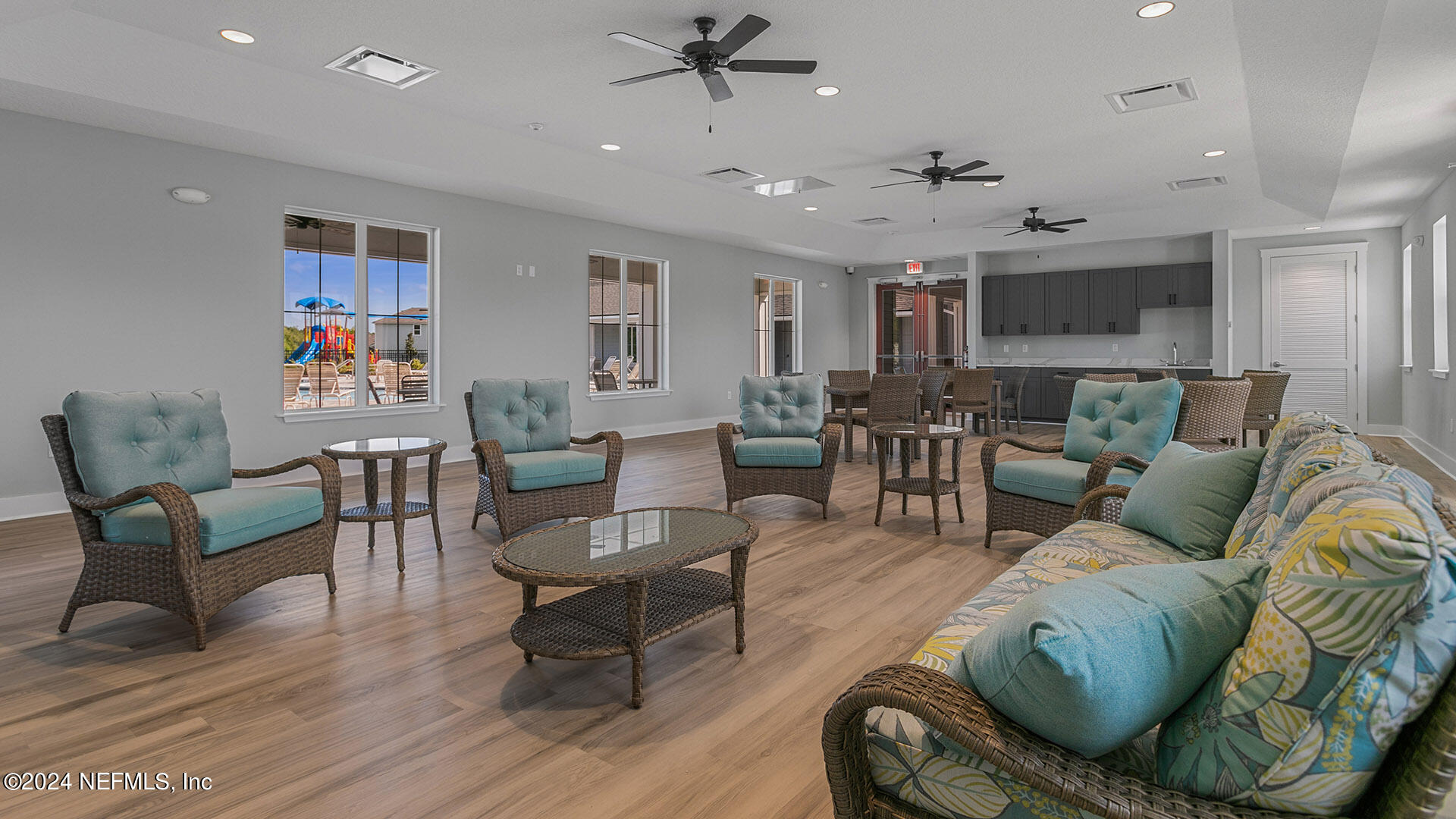 5561 Rustic Thorn Road Jacksonville, FL 32219 - Photo 44 of 63 a living room with furniture and a wooden floor
