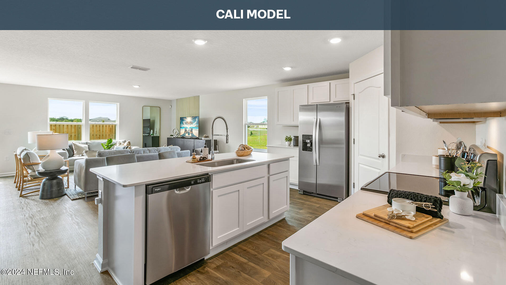 5561 Rustic Thorn Road Jacksonville, FL 32219 - Photo 5 of 63 a kitchen with stainless steel appliances granite countertop a sink refrigerator and cabinets
