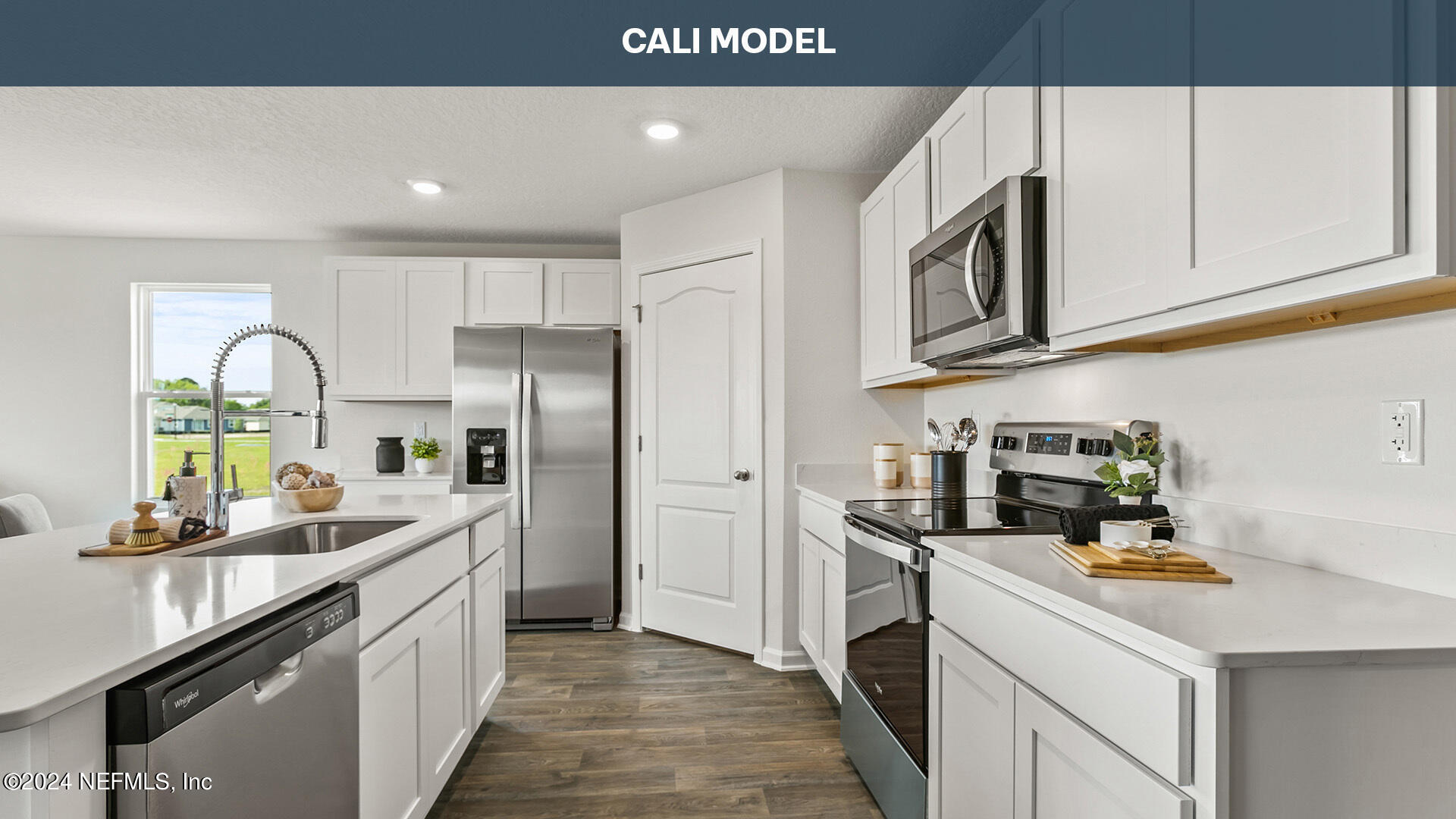 5561 Rustic Thorn Road Jacksonville, FL 32219 - Photo 8 of 63 a kitchen with stainless steel appliances granite countertop a sink and cabinets