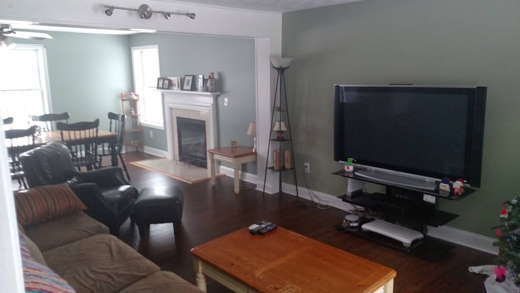 455 Hollis Road Lunenburg, MA 01462 - Photo 2 of 16 a room with furniture and a flat screen tv