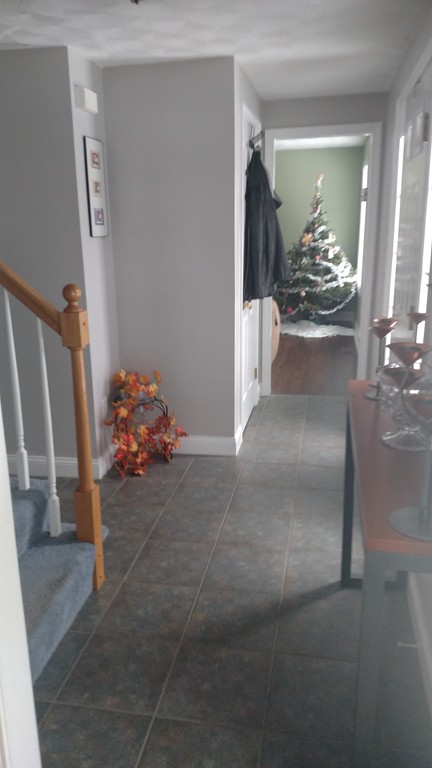 455 Hollis Road Lunenburg, MA 01462 - Photo 5 of 16 a view of a hallway with dining room view