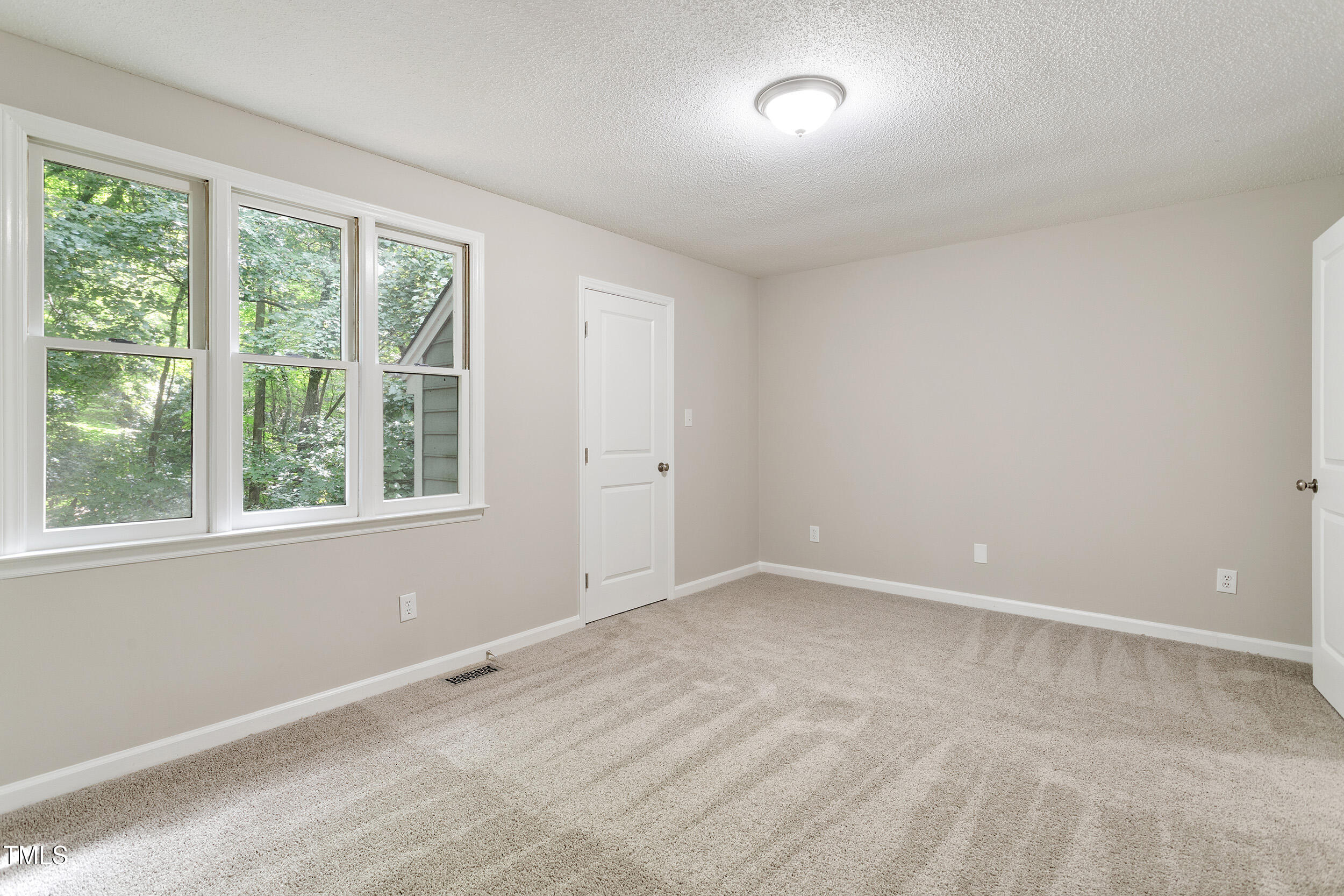 118 Rhum Place Garner, NC 27529 - Photo 17 of 26 an empty room with a window