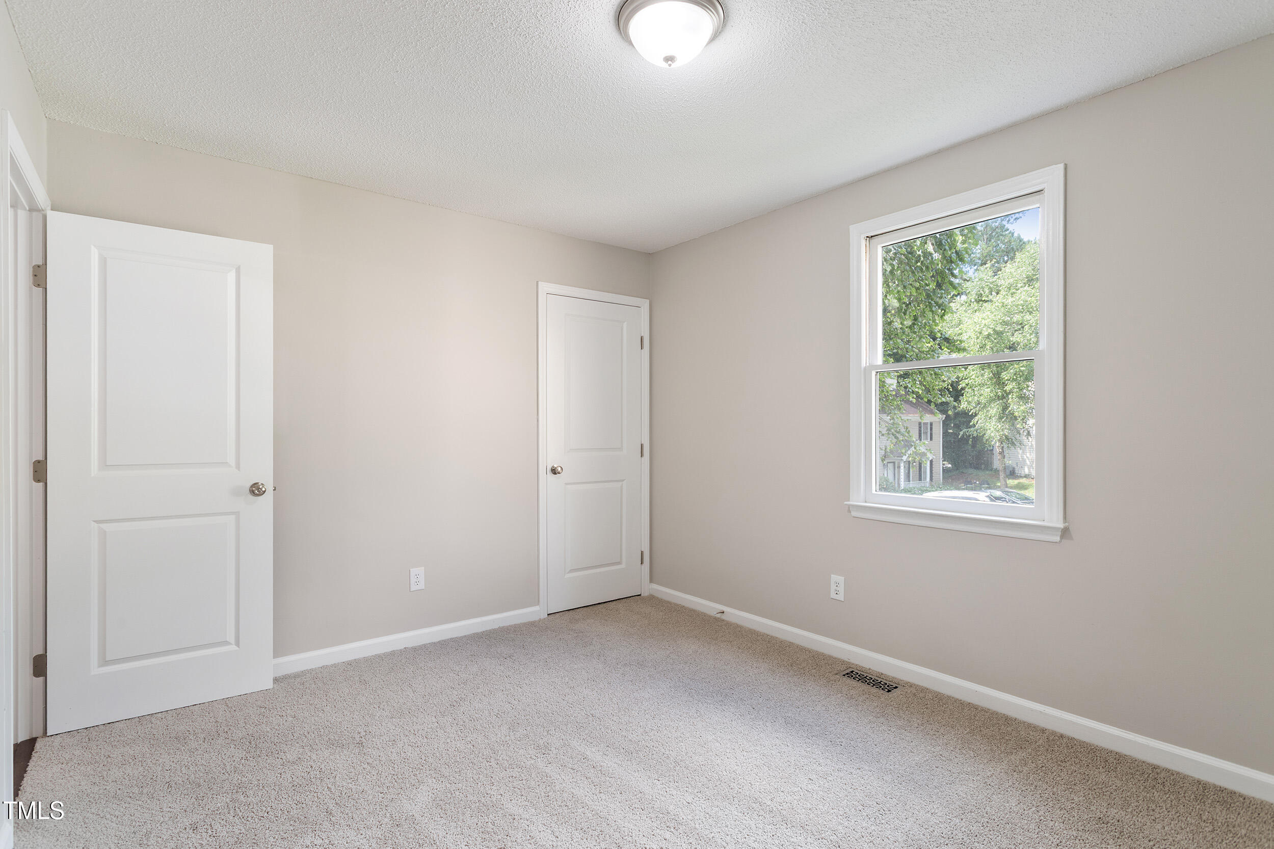 118 Rhum Place Garner, NC 27529 - Photo 19 of 26 a view of an empty room with a window