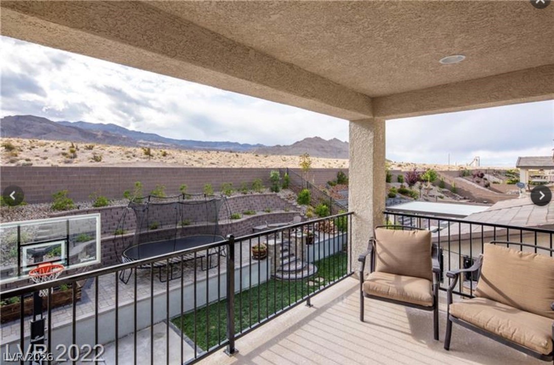 4631 Amazing View Street Las Vegas, NV 89129 - Photo 24 of 33 Enjoy the commanding desert and mountain vistas from this spacious, covered patio.