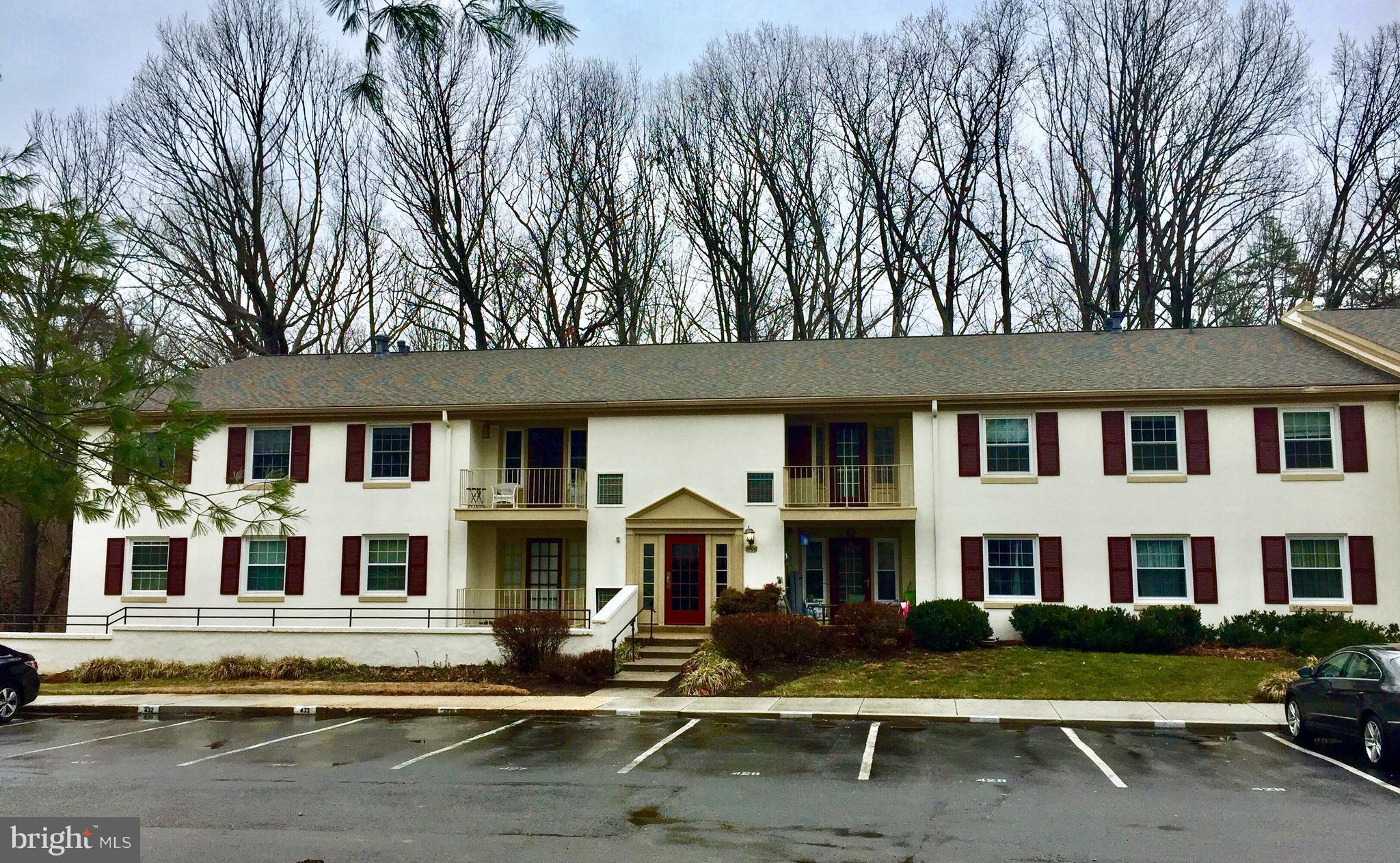 5900 Kingsford Road, Unit 424 Springfield, VA 22152 - Photo 1 of 1 a front view of residential houses with yard