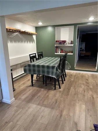 a view of a dining room with furniture