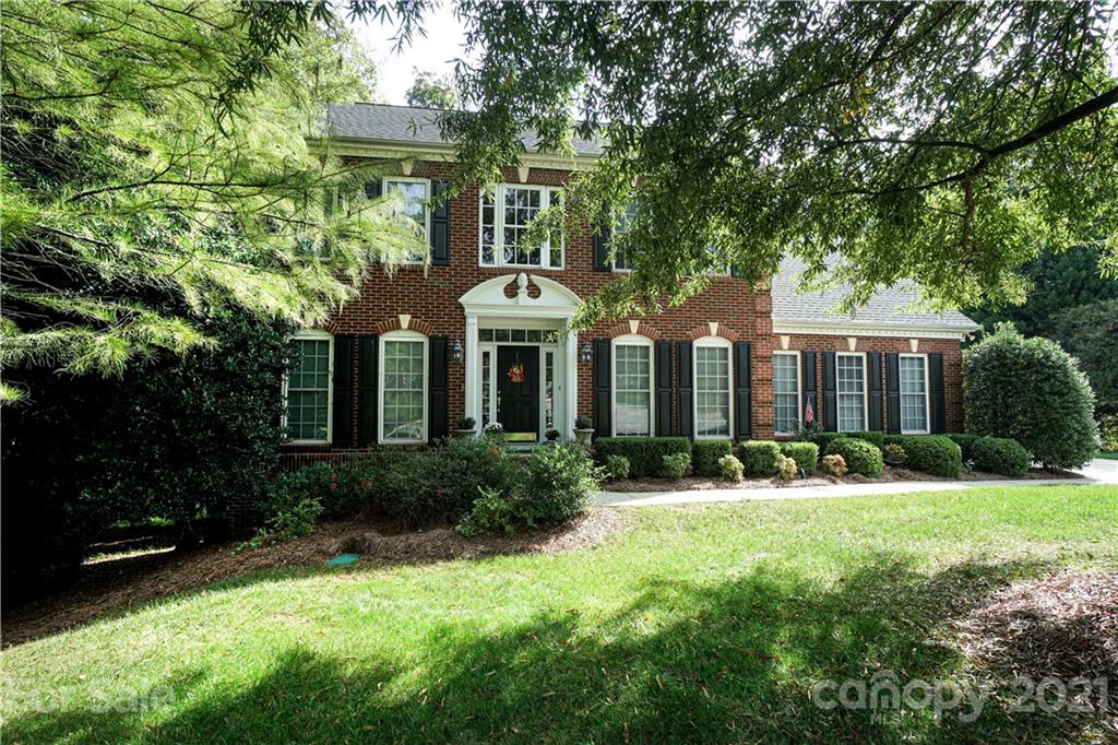 914 Chevis Court Fort Mill, SC 29708 - Photo 1 of 47 a front view of a house with a yard