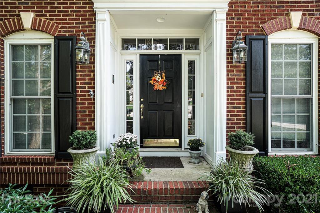914 Chevis Court Fort Mill, SC 29708 - Photo 2 of 47 a potted plant in front of a house