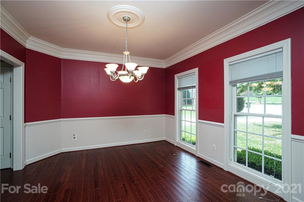 914 Chevis Court Fort Mill, SC 29708 - Photo 13 of 47 a view of empty room with wooden floor and fan