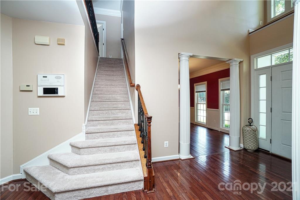 914 Chevis Court Fort Mill, SC 29708 - Photo 18 of 47 a view of entryway and hall with wooden floor