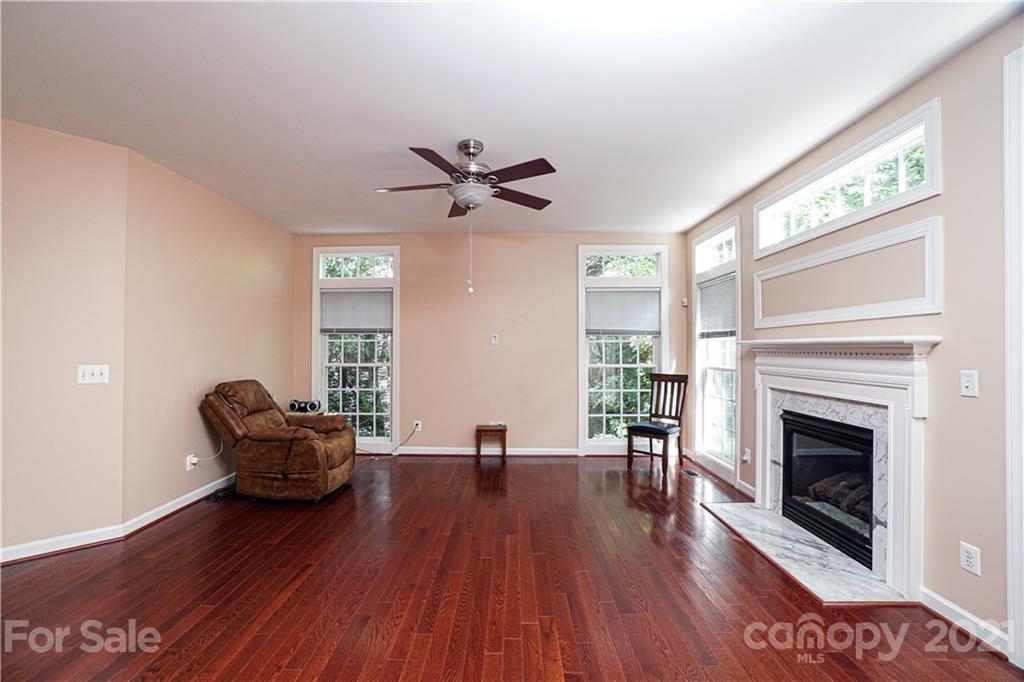 914 Chevis Court Fort Mill, SC 29708 - Photo 20 of 47 a living room with furniture and a fireplace