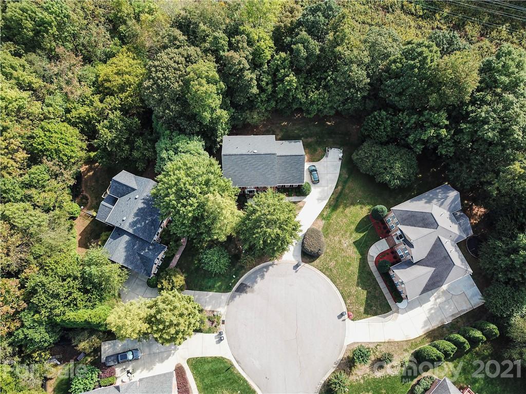 914 Chevis Court Fort Mill, SC 29708 - Photo 3 of 47 an aerial view of a house with outdoor space and a garden