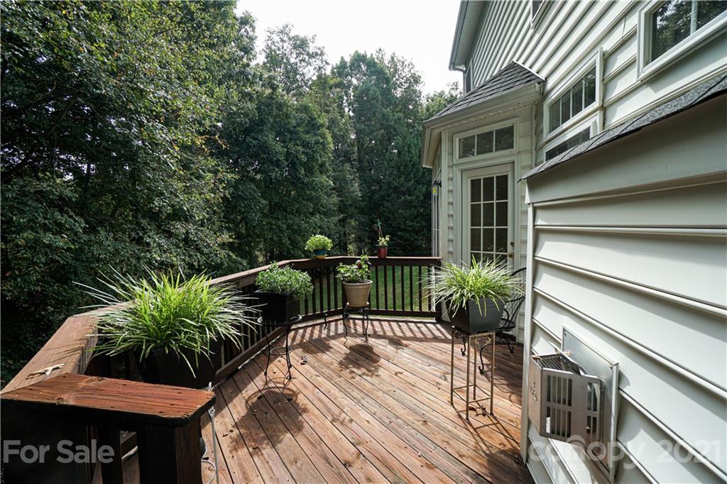 914 Chevis Court Fort Mill, SC 29708 - Photo 32 of 47 a view of a house with backyard and sitting area