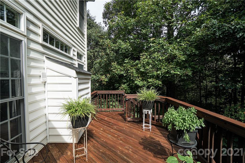 914 Chevis Court Fort Mill, SC 29708 - Photo 33 of 47 a balcony with wooden floor and outdoor seating