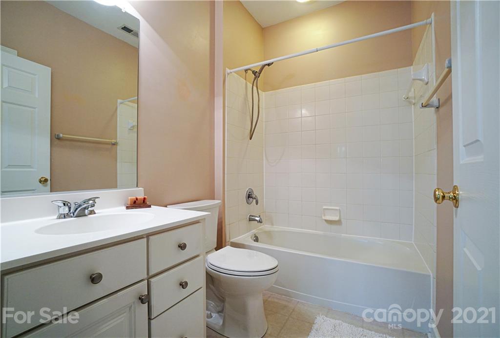 914 Chevis Court Fort Mill, SC 29708 - Photo 40 of 47 a bathroom with a sink a toilet and shower