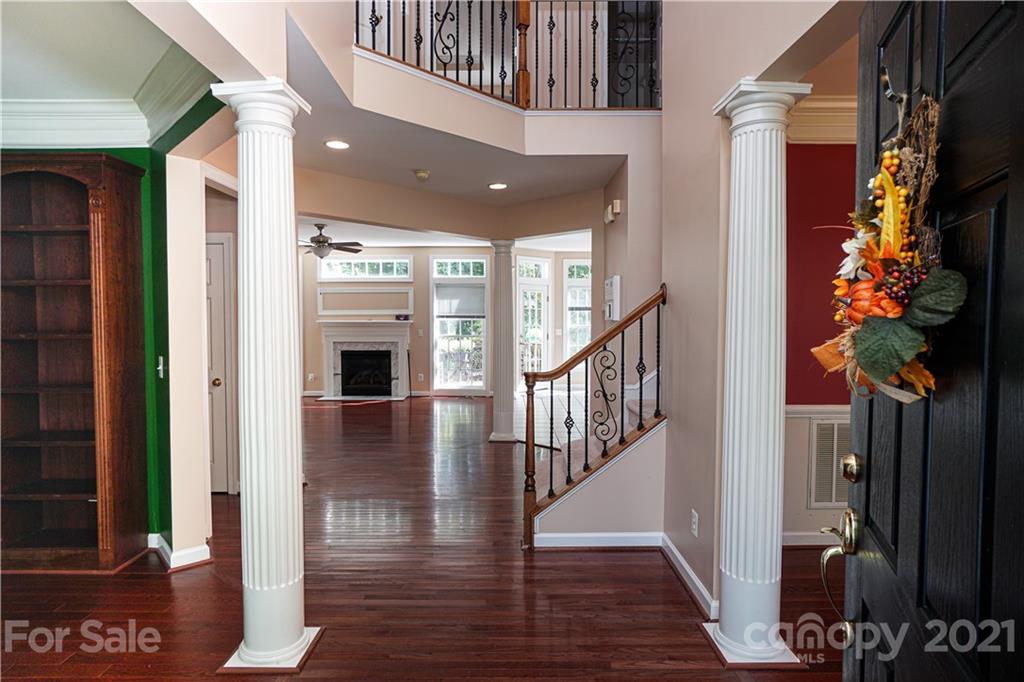 914 Chevis Court Fort Mill, SC 29708 - Photo 8 of 47 a view of entryway and hall with wooden floor