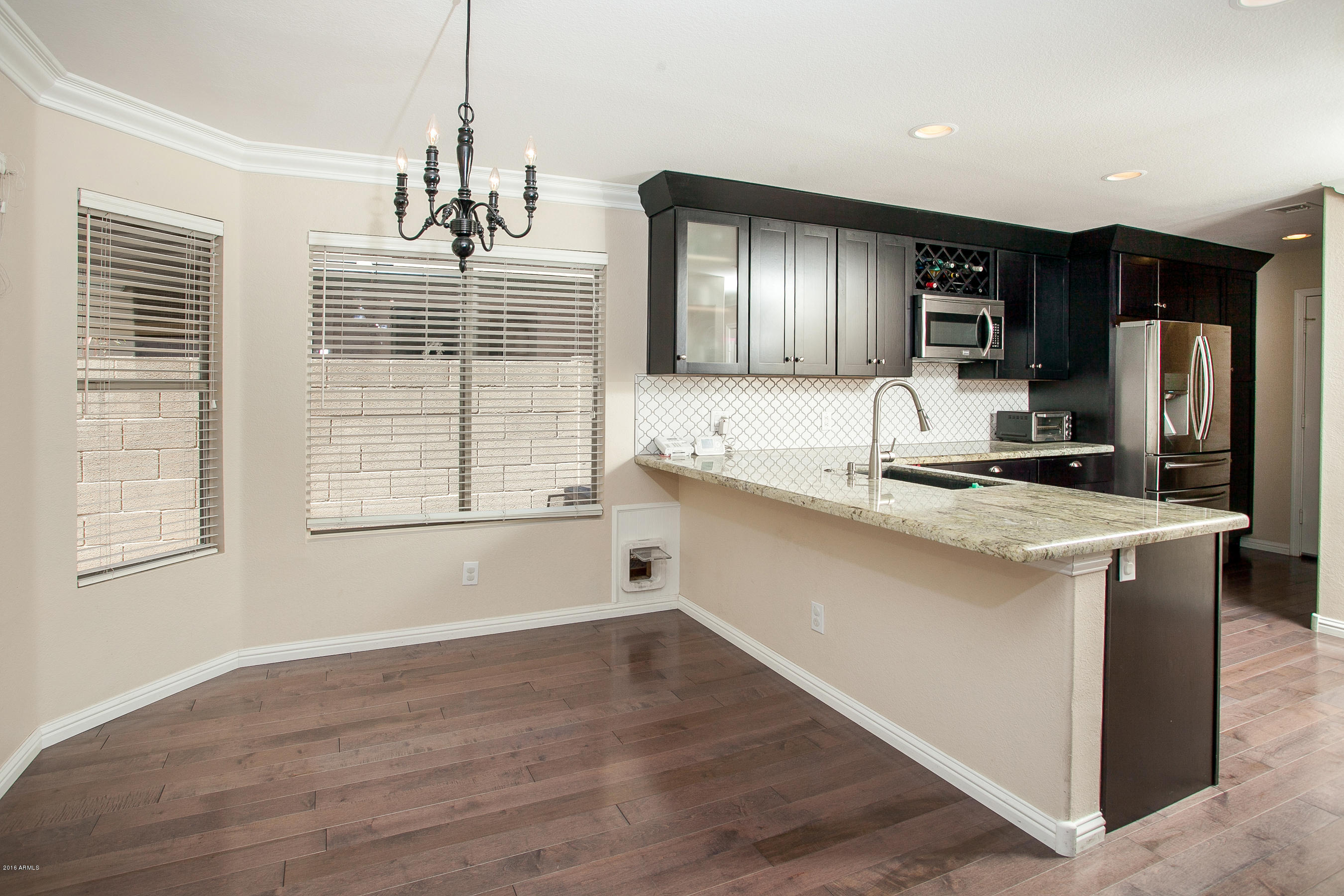 4815 East Mossman Road Phoenix, AZ 85054 - Photo 7 of 28 Kitchen 2