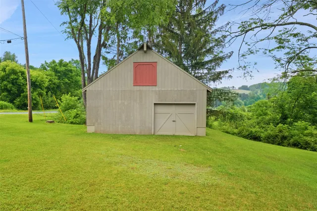 a house with a tree in front of it