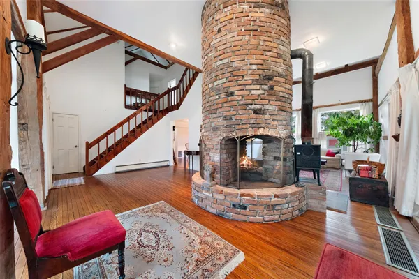a view of entryway livingroom and hall