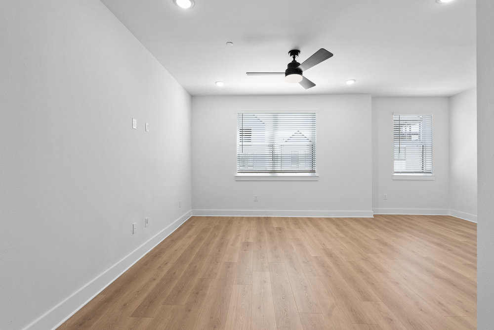 4309 Prevail Lane, Unit 18 Austin, TX 78731 - Photo 34 of 40 wooden floor in an empty room with a window