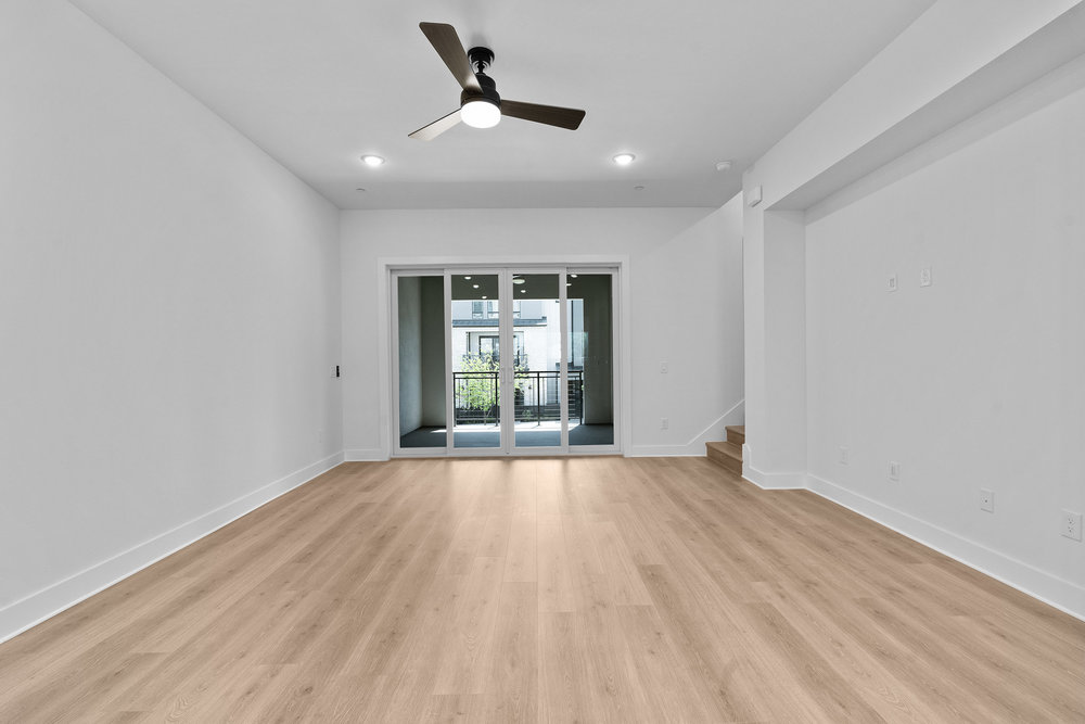 4309 Prevail Lane, Unit 18 Austin, TX 78731 - Photo 38 of 40 wooden floor in an empty room with a window
