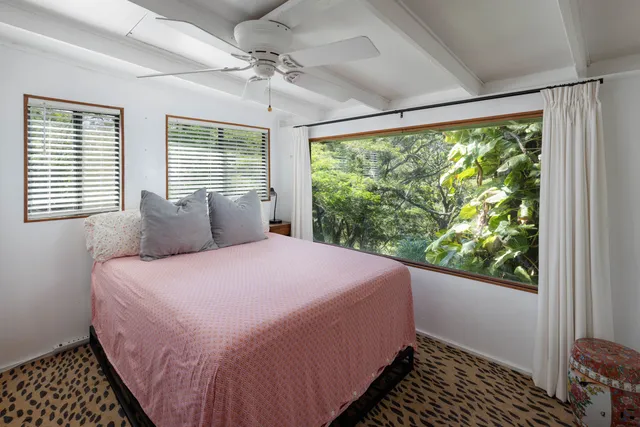 a outdoor dining space with furniture and window