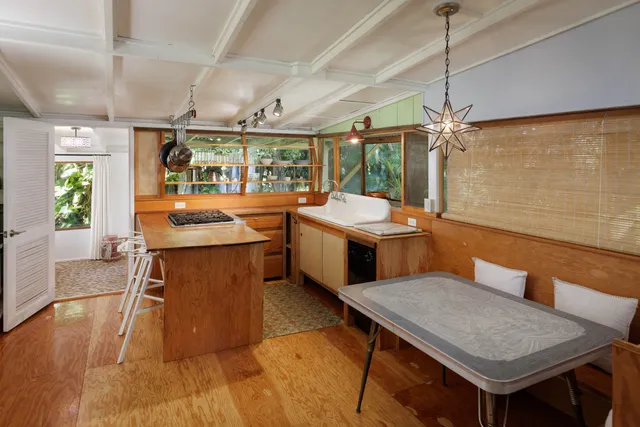 a view of entryway with workspace and window