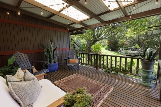 a backyard of a house with lots of green space