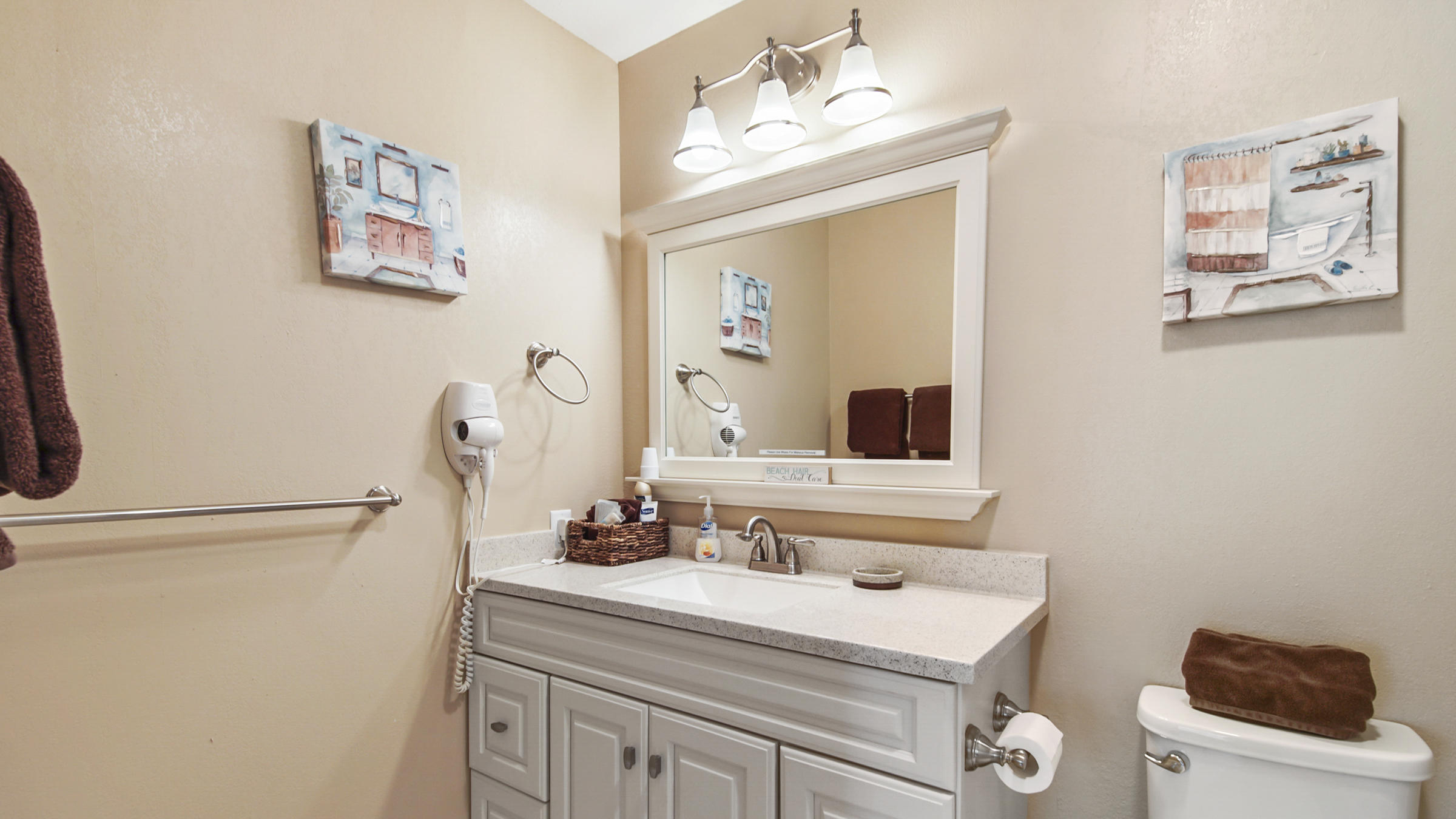 241 Ellis Road, Unit 51 Miramar Beach, FL 32550 - Photo 15 of 34 a bathroom with a sink and a mirror