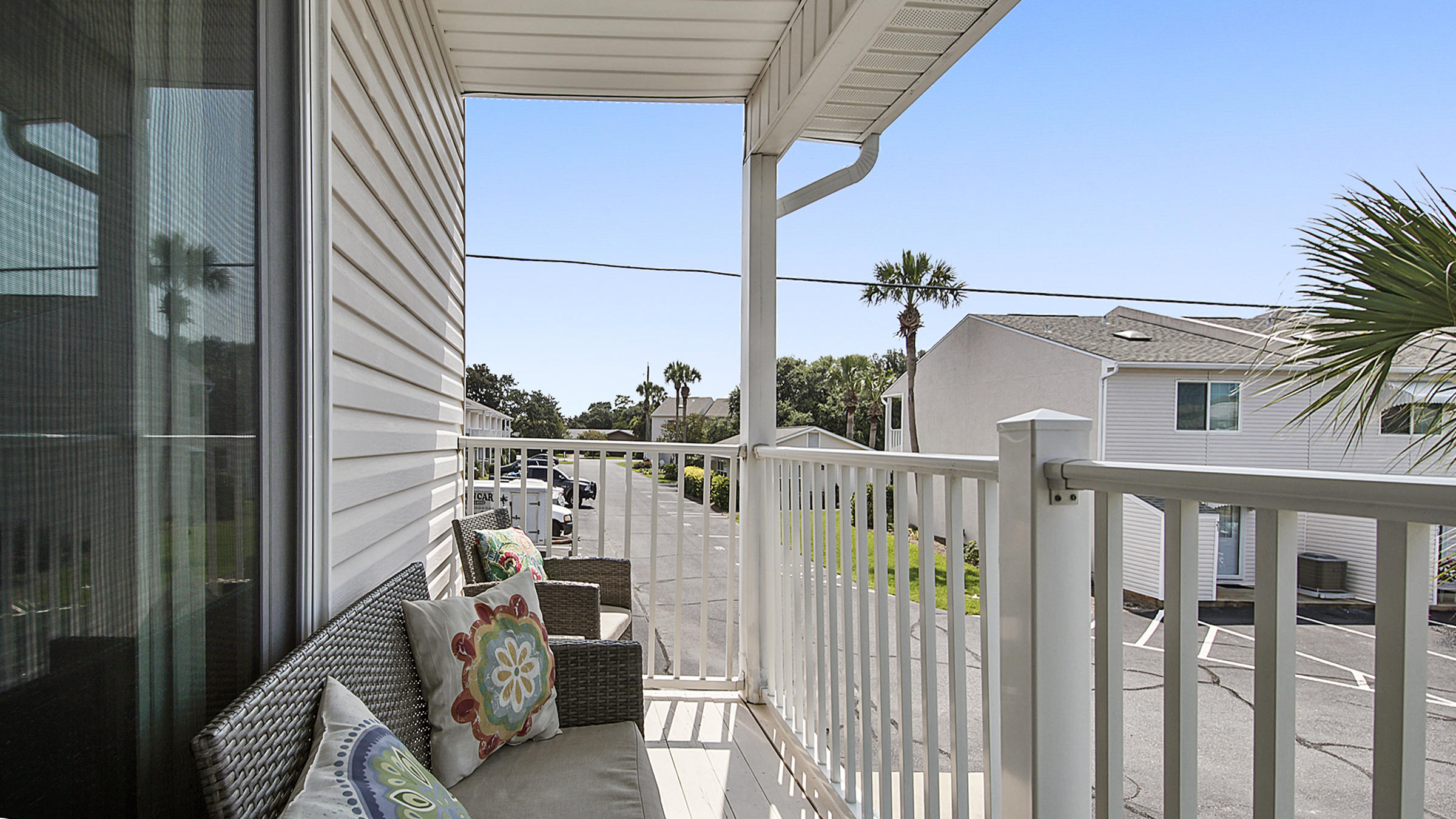 241 Ellis Road, Unit 51 Miramar Beach, FL 32550 - Photo 22 of 34 a view of a balcony with chairs