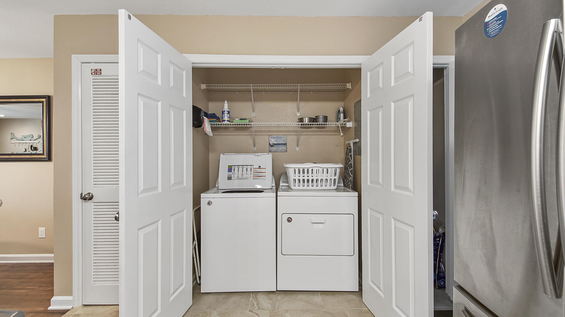 241 Ellis Road, Unit 51 Miramar Beach, FL 32550 - Photo 25 of 34 a room with storage and utility
