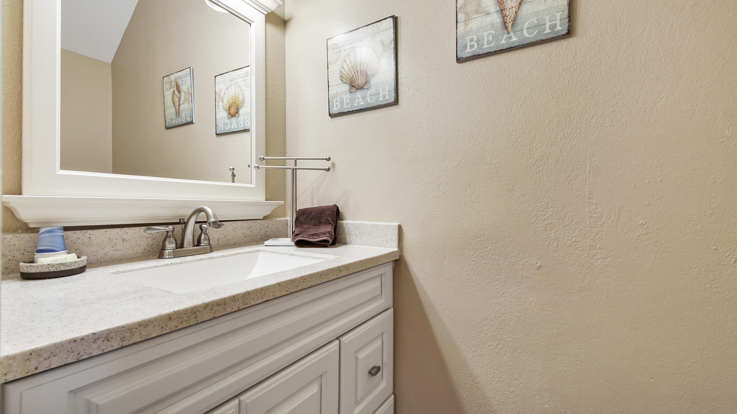 241 Ellis Road, Unit 51 Miramar Beach, FL 32550 - Photo 10 of 34 a bathroom with a sink and a mirror