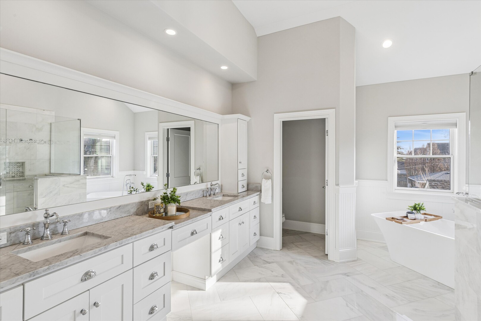 502 South Fairview Avenue Elmhurst, IL 60126 - Photo 26 of 36 a spacious bathroom with a granite countertop double vanity sink a mirror and a bathtub