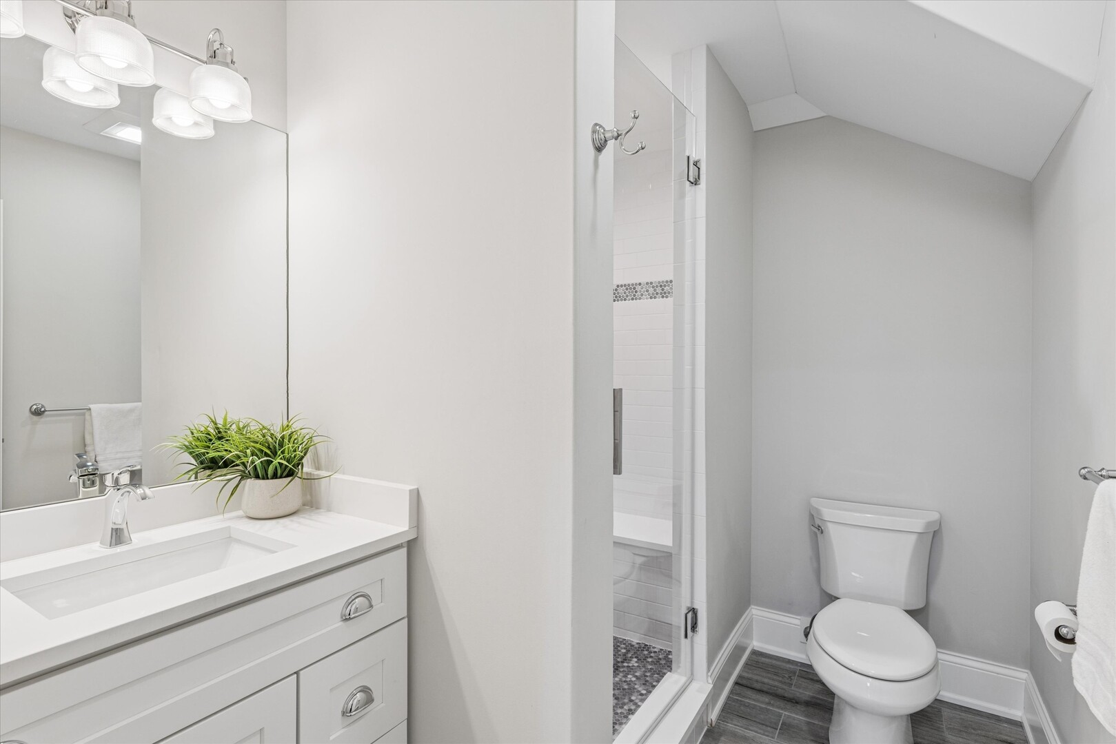 502 South Fairview Avenue Elmhurst, IL 60126 - Photo 27 of 36 a bathroom with a sink a toilet and a mirror