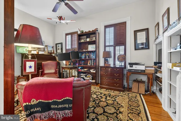 a view of a room with a bath tub and shower
