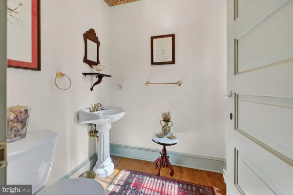 a very nice looking open kitchen with stainless steel appliances granite countertop a sink and cabinets