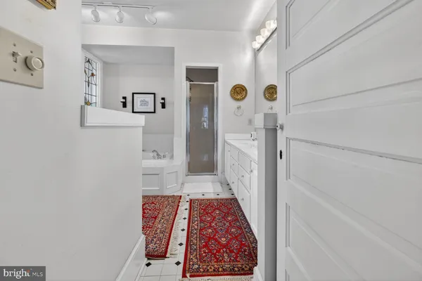 a very nice looking dining room with a rug