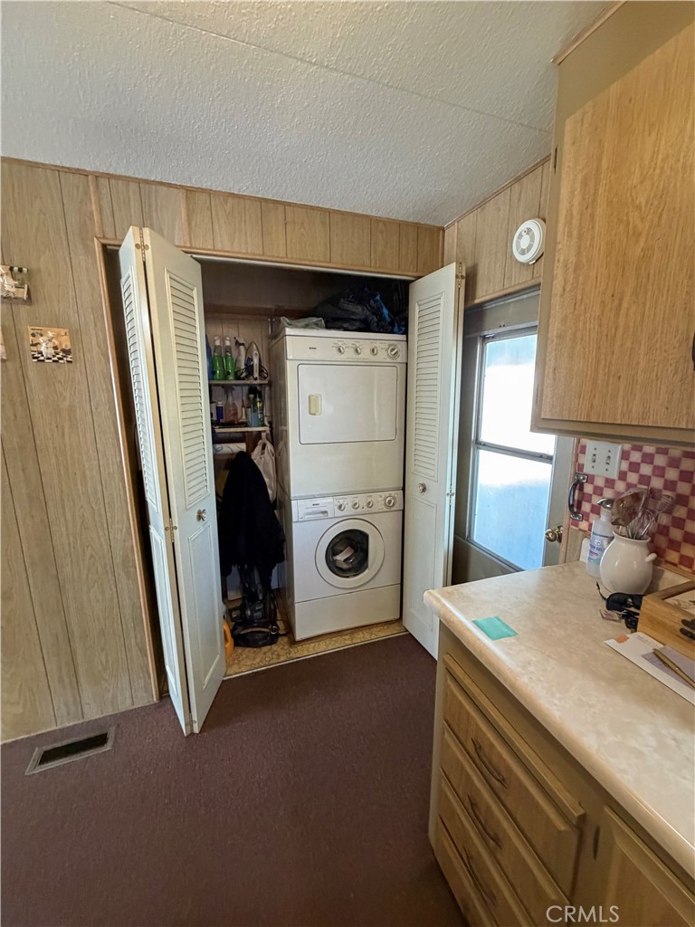 3701 Fillmore Street, Unit 64 Riverside, CA 92505 - Photo 14 of 26 a bathroom with a sink a mirror and shower