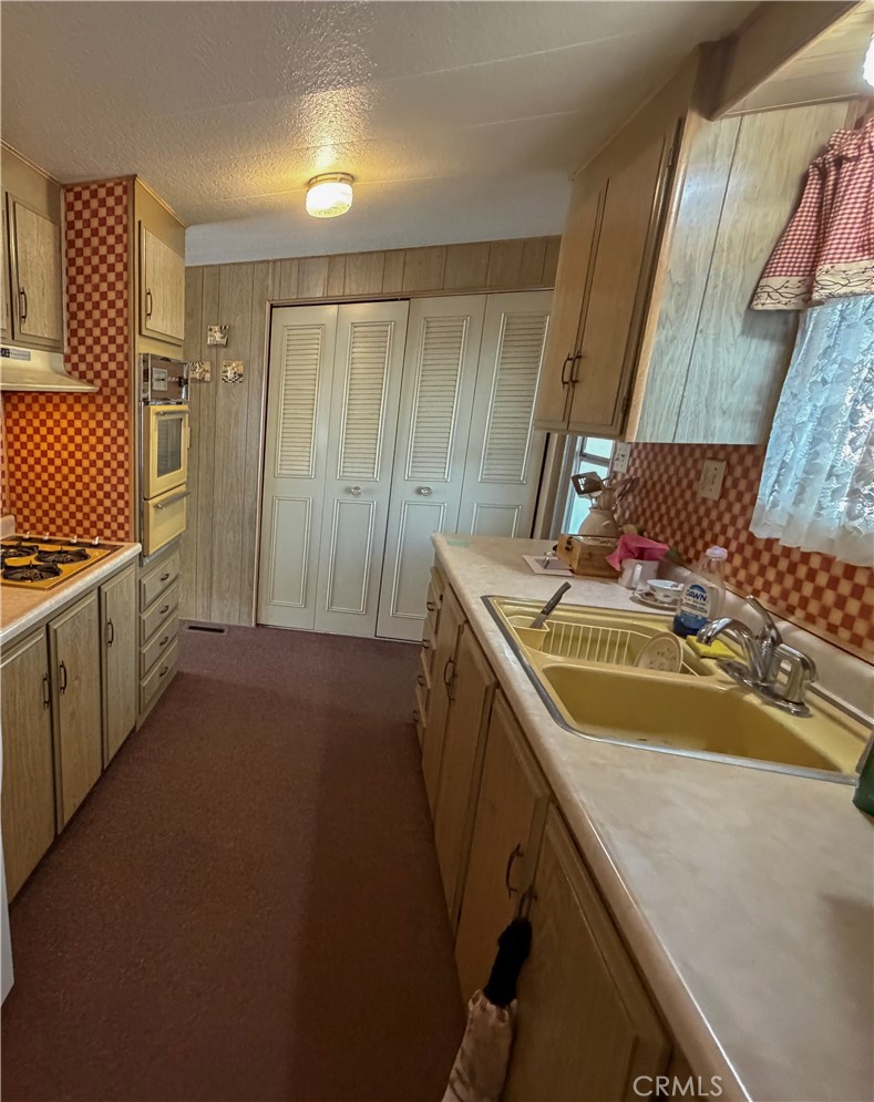 3701 Fillmore Street, Unit 64 Riverside, CA 92505 - Photo 9 of 26 a room with storage and utility