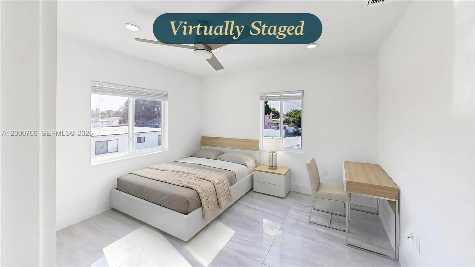 1886 Northwest 68th Street Miami, FL 33147 - Photo 28 of 56 a bedroom with a bed and a window