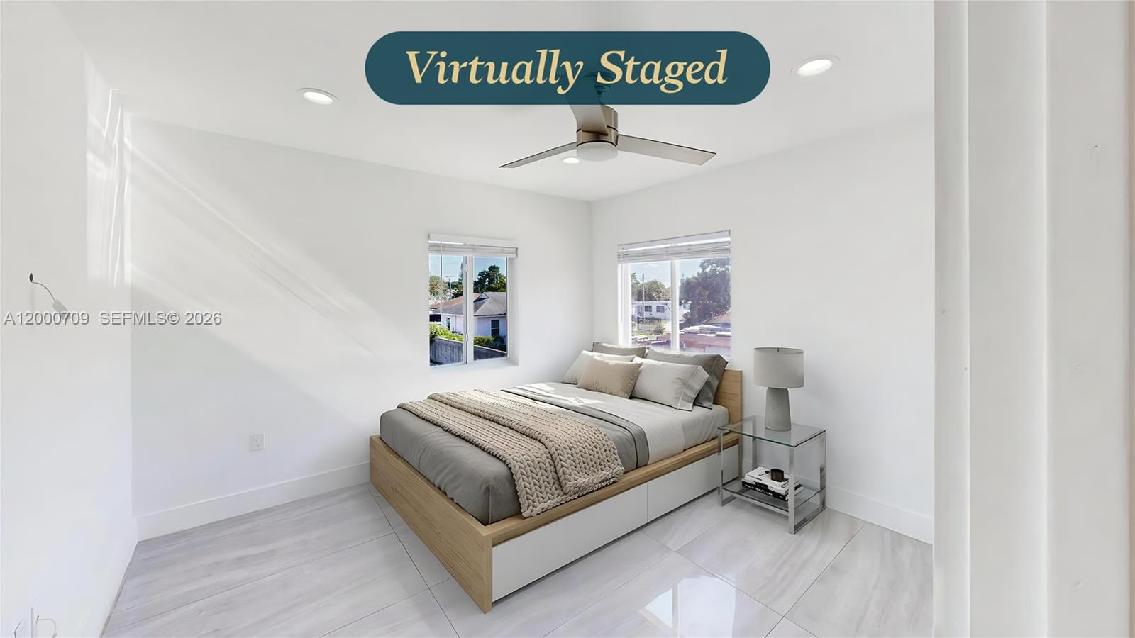1886 Northwest 68th Street Miami, FL 33147 - Photo 32 of 56 a bedroom with a bed and a window
