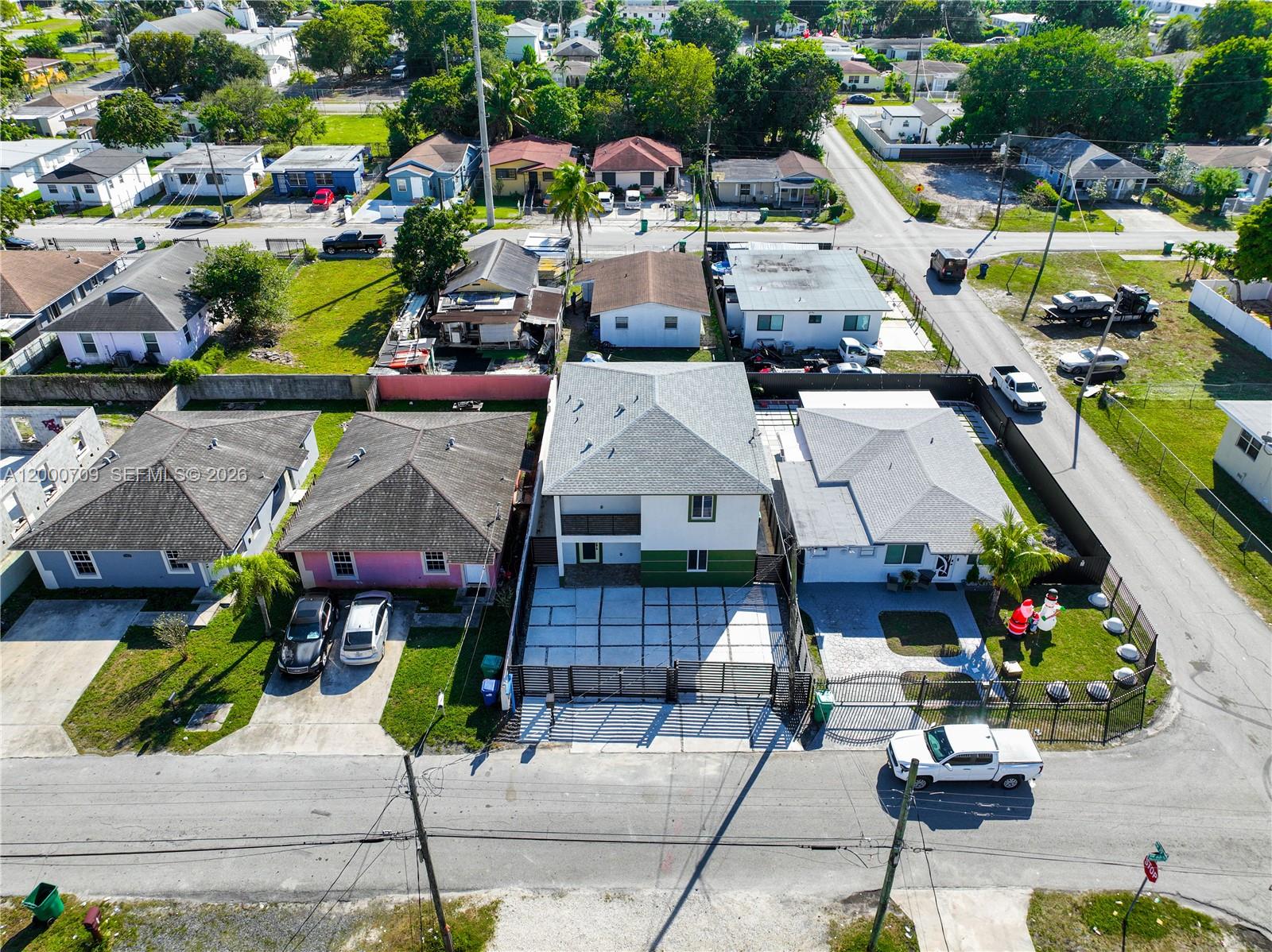 1886 Northwest 68th Street Miami, FL 33147 - Photo 52 of 56 a picture of houses with outdoor space