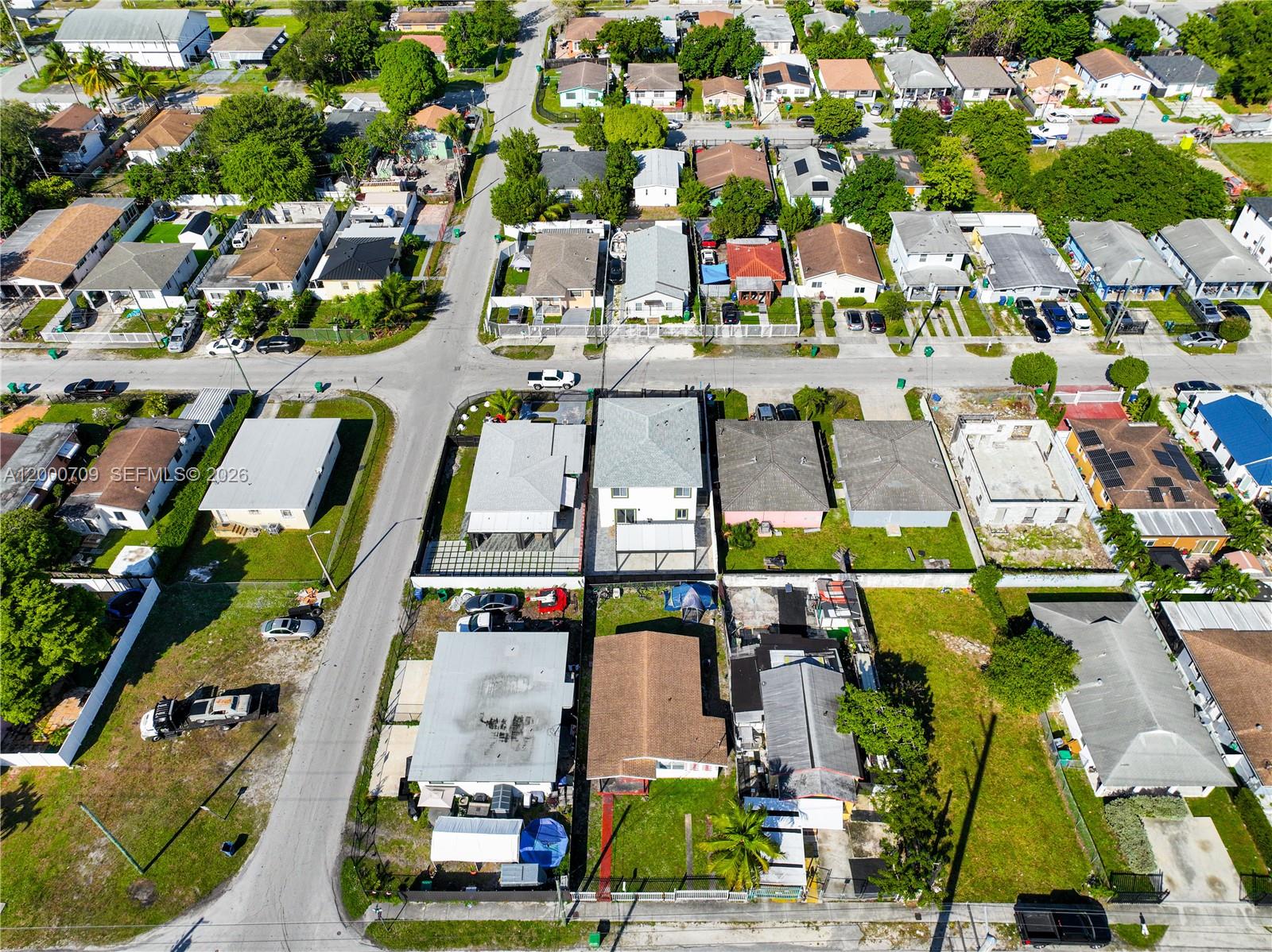 1886 Northwest 68th Street Miami, FL 33147 - Photo 54 of 56 an aerial view of residential houses with outdoor space