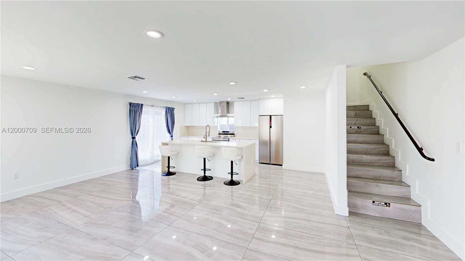 1886 Northwest 68th Street Miami, FL 33147 - Photo 10 of 56 a view of kitchen with furniture and refrigerator