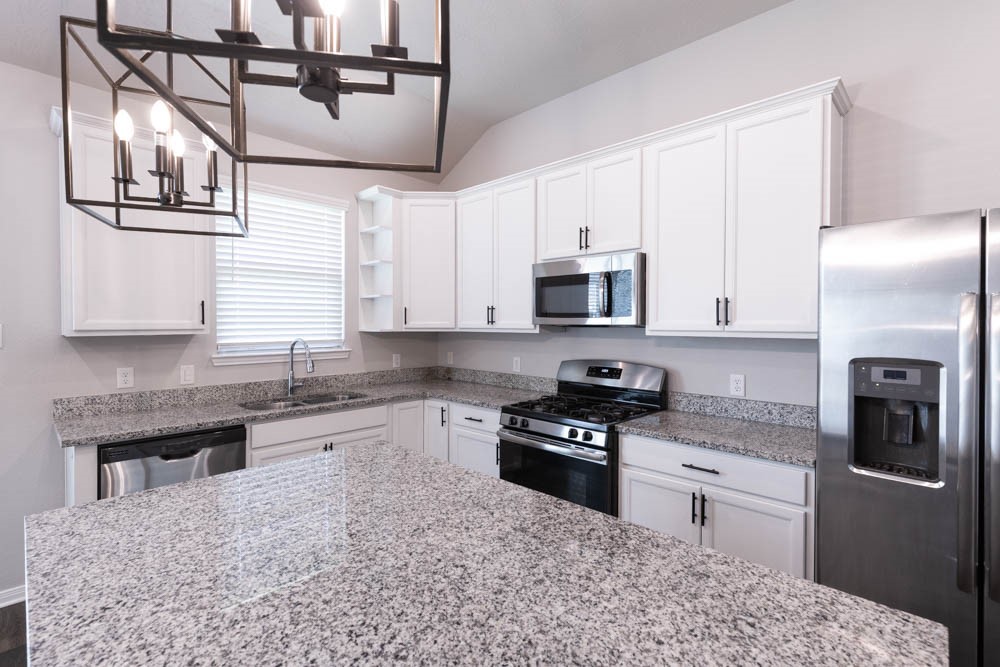 1001 Rootstock Rd. Brenham, TX 77833 - Photo 11 of 28 Granite counters.